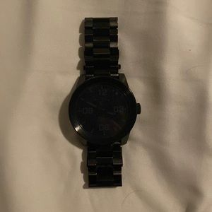 Black on black Nixon watch
